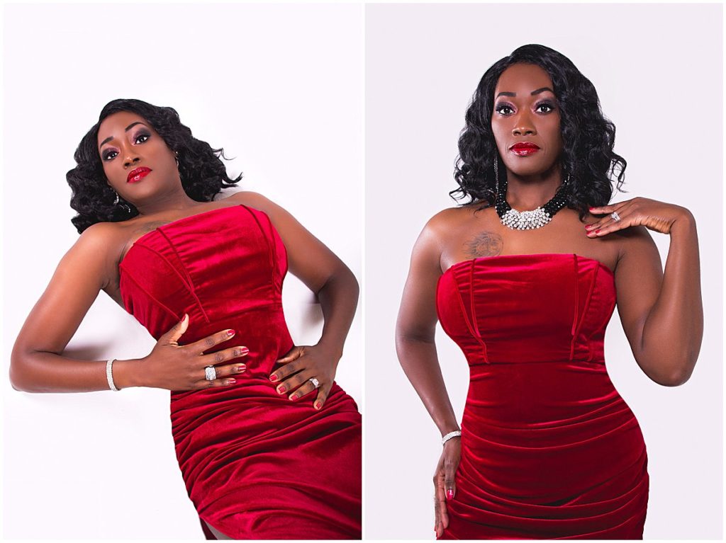 A black woman in a red gown poses for her birthday photo session