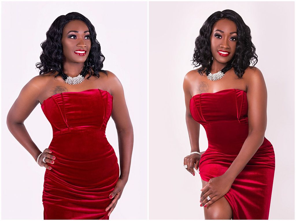 A black woman in a red gown poses for her birthday photo session