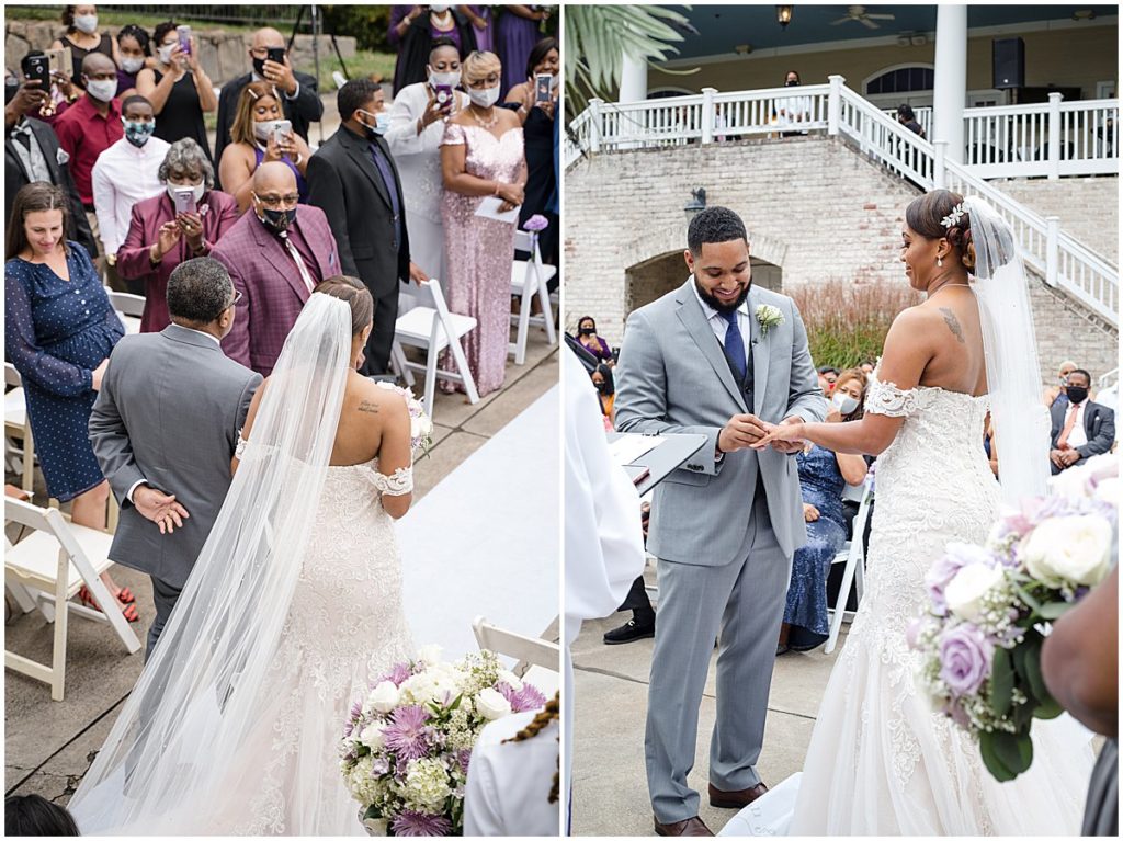 Bride walks down the aisle on the left. On the right, the groom places the ring on the bride's finger.